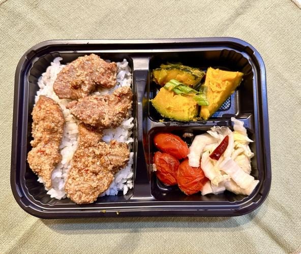 Marinated Pork Steamed in Lotus Leaf Over Rice Bento.